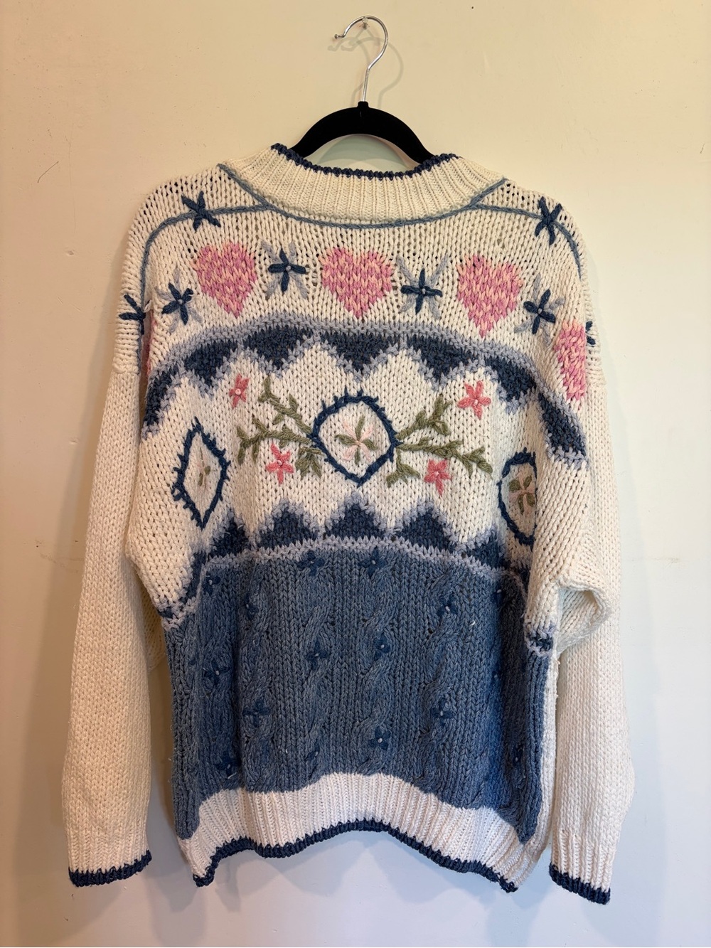Oversized cable knit hearts with flowers sweater